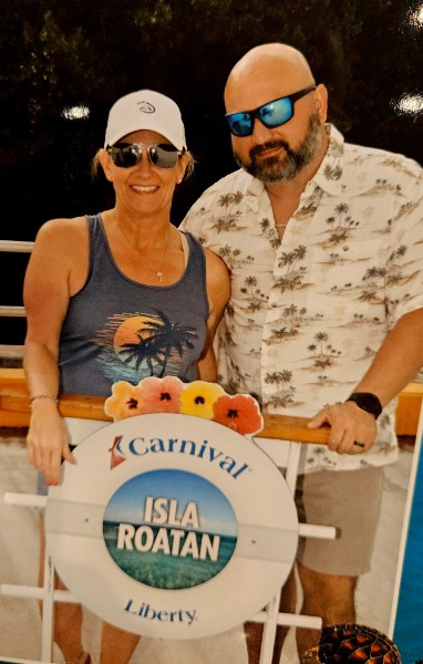 Diana Bertrand and a travel companion aboard Carnival Liberty in Isla Roatan.