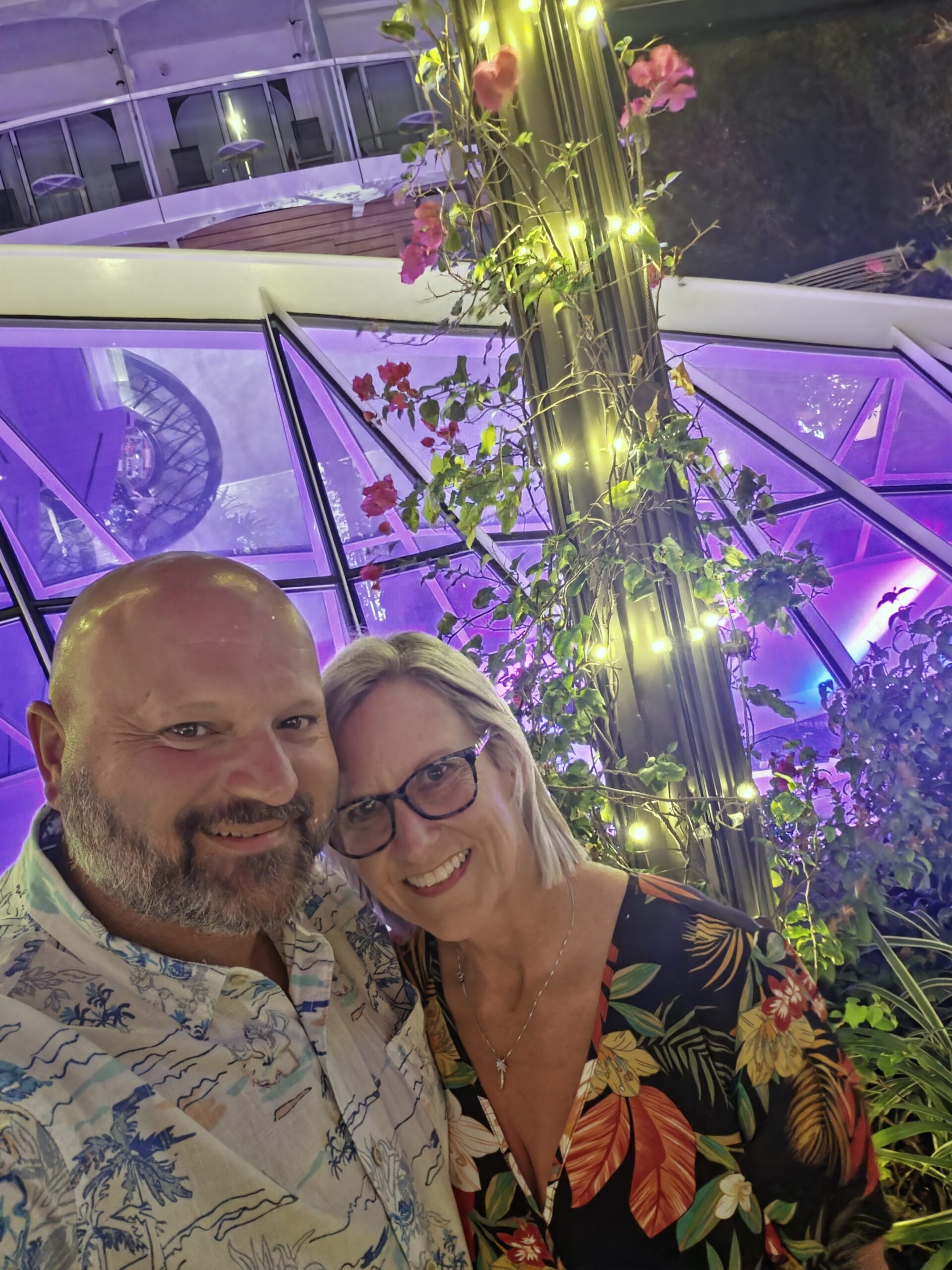 Couple enjoying an evening aboard a cruise ship.